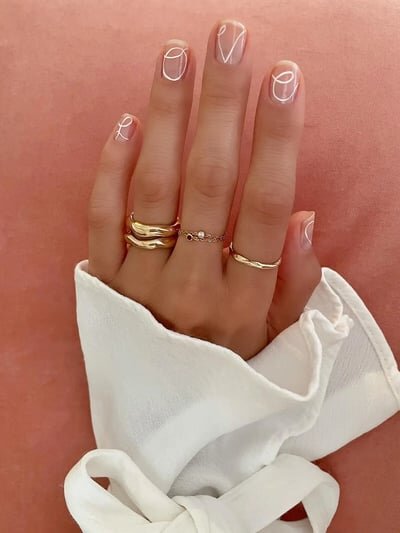 unghie san valentino 2024 scritta love